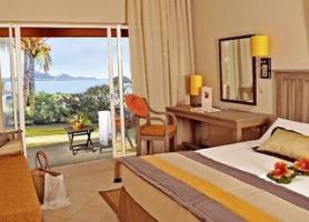 Jeden z pokojů v hotelu hotelu Preskil Beach Resort, Pointe Jerome